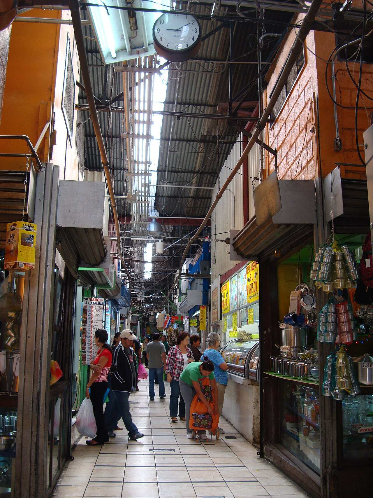 Shoppers walking past stalls inside the Mercado Central in San Jose, Costa Rica